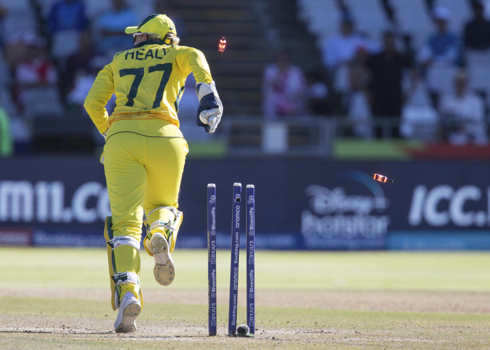 Australia's Alyssa Healy runs out India's Yastika Bhatia during the Women's T20 World Cup semi final cricket match in Cape Town, South Africa, Thursday Feb. 23, 2023. (AP Photo/Halden Krog)