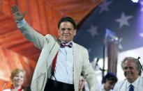 FILE - In this July 3, 2017, file photo, conductor Keith Lockhart waves during a rehearsal for the annual Boston Pops Fireworks Spectacular on the Esplanade in Boston. Lockhart marks 25 years with the Boston Pops in 2020, making him the orchestra's second longest-tenured conductor after Arthur Fiedler. (AP Photo/Michael Dwyer, File)