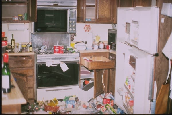 A view of damage to a kitchen in a townhouse near the Northridge Fashion Center in Southern California. According to the U.S. Geological Survey, an occupant cut her foot on glass when she ran into the kitchen area in the predawn hours after the
