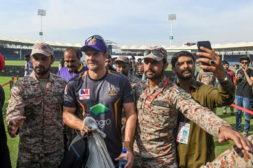 Quetta's Australian star Shane Watson leaves the ground under heavy secuirty after practising in Karachi this week