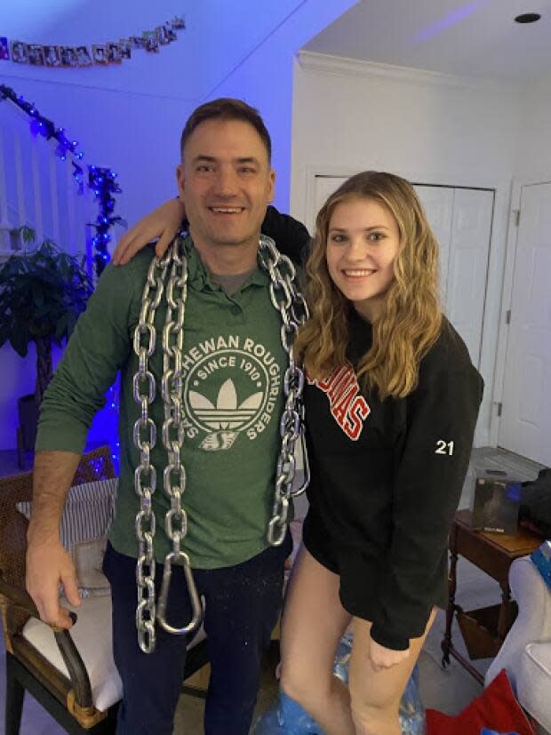 Grace Haines (right) enjoyed weightlifting and often trained with her father Chris (left). 