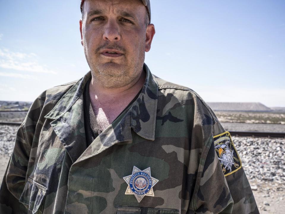 A member of an armed right-wing group known for detaining migrants entering the US has been arrested for impersonating a Border Patrol agent.Jim Benvie is alleged to have impersonated the agent in mid-April, according to two charges filed by the US Department of Justice.The 44-year-old is the spokesperson for the Guardian Patriots, which is one of a number of right-wing armed militias roaming the US-Mexico border.“President [Donald] Trump declared a national emergency on the border [and] we came down to find out what that emergency is,” Mr Benvie previously said in a video posted online explaining the group’s motivations.Mr Benvie was arrested on Friday in Oklahoma, after a warrant was issued for his arrest in New Mexico on Wednesday.The 44-year-old had previously denied that his militia posed as Border Patrol agents.But photographs taken of him in March show Mr Benvie wearing a camouflage jacket with a badge reading “Fugitive Recovery Agent” and a patch with an eagle-head insignia.He claims to be a citizen journalist gathering proof of the need for the border wall promised by President Trump.Members of the Guardian Patriots live in a camp near Sunland Park, New Mexico.The armed group was originally part of the United Constitutional Patriots, a similar organisation described by the American Civil Liberties’ Union (ACLU) as a “fascist militia”.The ACLU said that militia members were illegally detaining migrants who crossed the border at gunpoint.“Militia is a term used in a rather fluid manner,”Jonathan Turley, a law professor at George Washington University, previously told The Independent.“It’s loosely defined as an armed group engaged in some paramilitary operation.”Mr Turley said the US Supreme Court had ruled that it is an an individual right to bear arms.If militia members lawfully assemble without trespassing, he added, they are allowed to exist in the way neighbourhood patrols do.Larry Hopkins, the UCP’s leader, was arrested in April on charges of being a felon in possession of firearms.Mr Benvie remains in federal custody and is expected to appear at a court hearing on Tuesday.Additional reporting by agencies