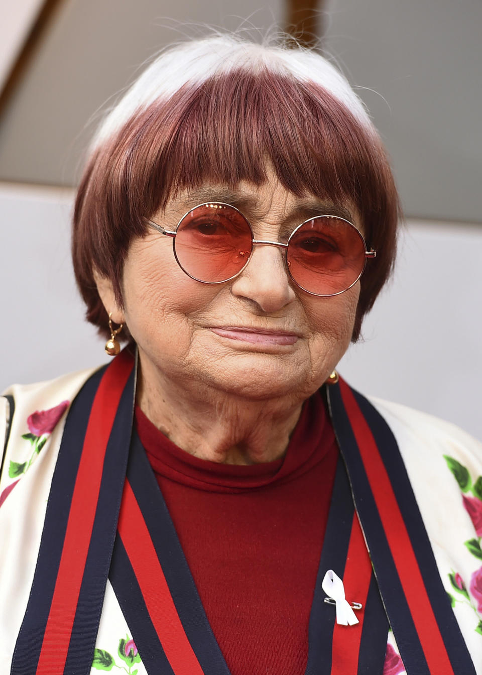 Filmmaker Agnes Varda arrives at the Oscars in Los Angeles on March 4, 2018. The French New Wave pioneer who for decades beguiled, challenged and charmed moviegoers, died of cancer on March 29. She was 90. (Photo by Jordan Strauss/Invision/AP)