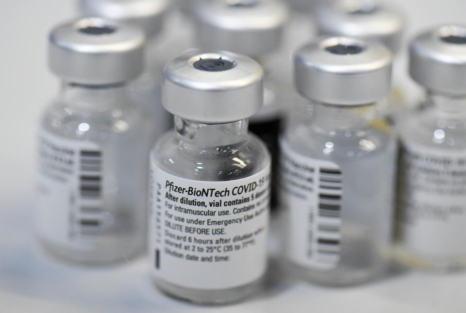 Empty vials of the Pfizer-BioNTech COVID-19 disease vaccine are displayed at the regional corona vaccination centre in Ludwigsburg, southern Germany, on January 22, 2021. (Photo: THOMAS KIENZLE/AFP via Getty Images)