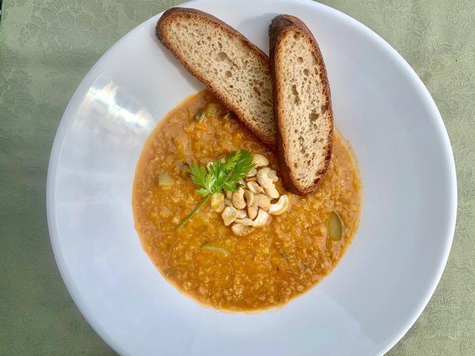 The Mulligatawny soup at Root2RiseNY in Pleasantville, accompanied by gluten-free bread, is a favorite of Food Reporter Jeanne Muchnick.