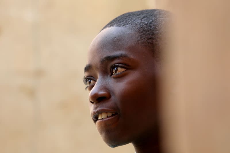 FILE PHOTO: Annas Shuaibu, a rescued student, looks on after he returned home in Kankara