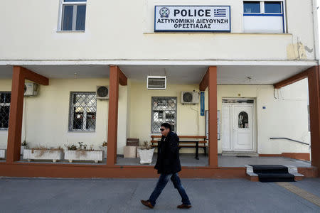 A man walks past the Police headquarters of the northern city of Orestiada, Greece, February 24, 2017. REUTERS/Alexandros Avramidis