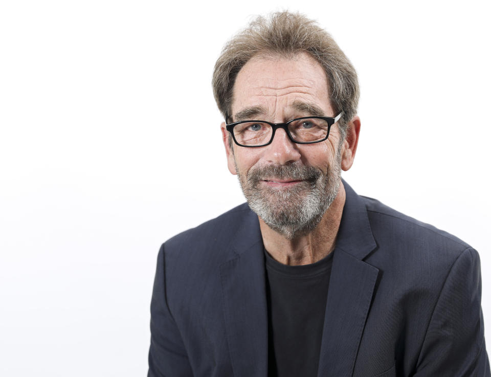 FILE - Musician Huey Lewis poses for a portrait in New York on Oct. 2, 2019. Lewis, who with his band The News stormed radio in the 1980s with such rock-pop hits as “The Power of Love” and “I Want a New Drug,” is about to take his music to a Broadway stage with “The Heart of Rock & Roll," starting March 2024. (Photo by Brian Ach/Invision/AP, File)