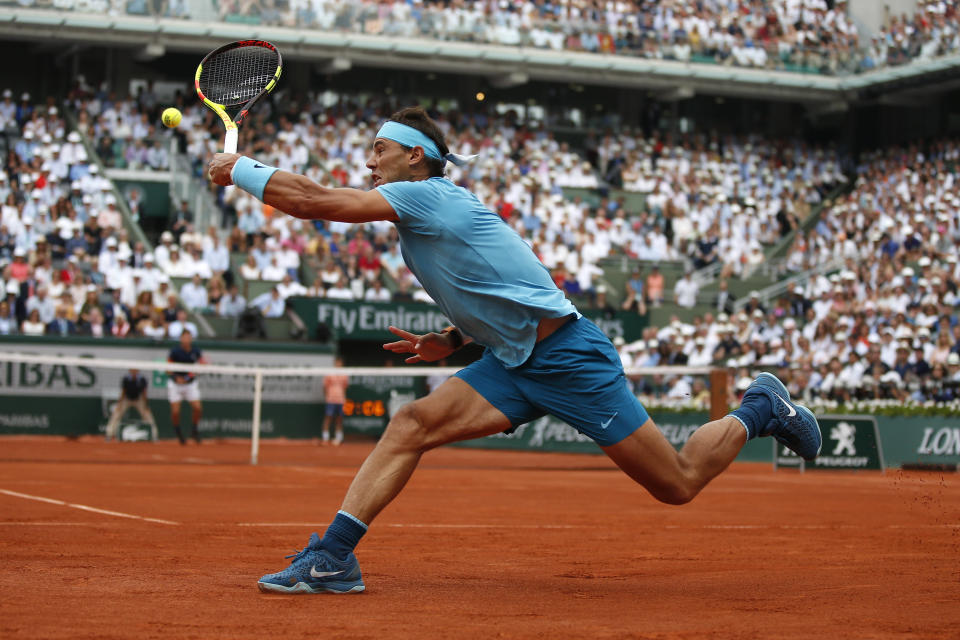 FILE - In this June 10, 2018, file photo, Spain's Rafael Nadal returns the ball to Austria's Dominic Thiem during the men's final match of the French Open tennis tournament at the Roland Garros stadium in Paris. (AP Photo/Thibault Camus, File)