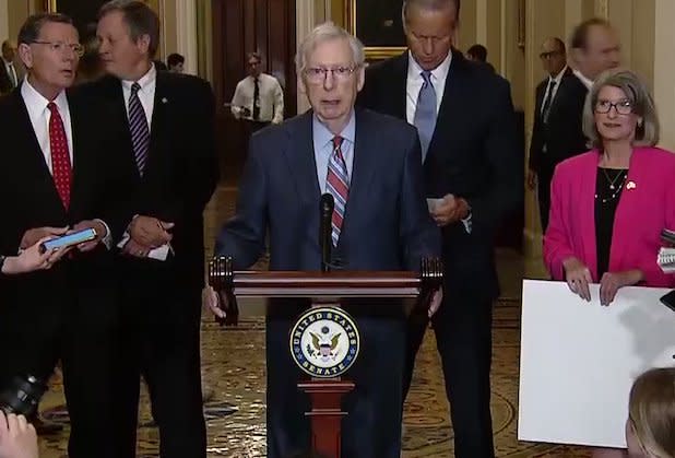 Mitch McConnell freezes at press conference and is escorted away