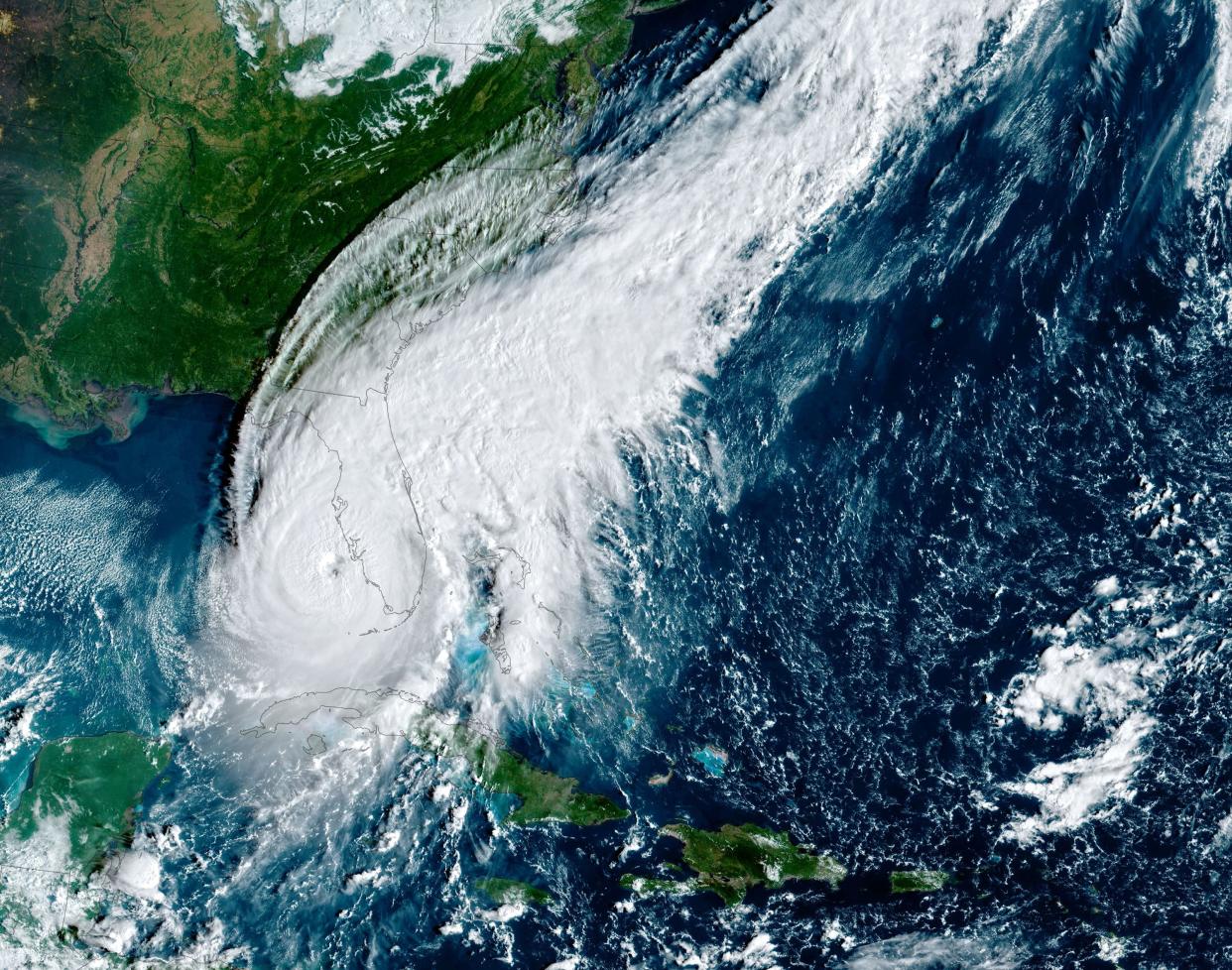 In this NOAA handout image taken by the GOES satellite at 13:10 UTC, Hurricane Ian approaches Florida on Sept. 28, 2022, in the Gulf of Mexico. The storm is expected to bring a potentially life-threatening storm surge and hurricane-force winds.