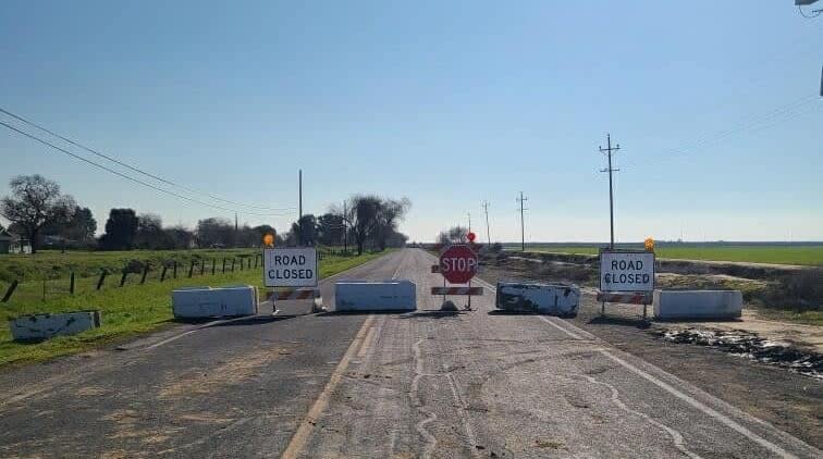 Barriers and signs blocking Kasson Road