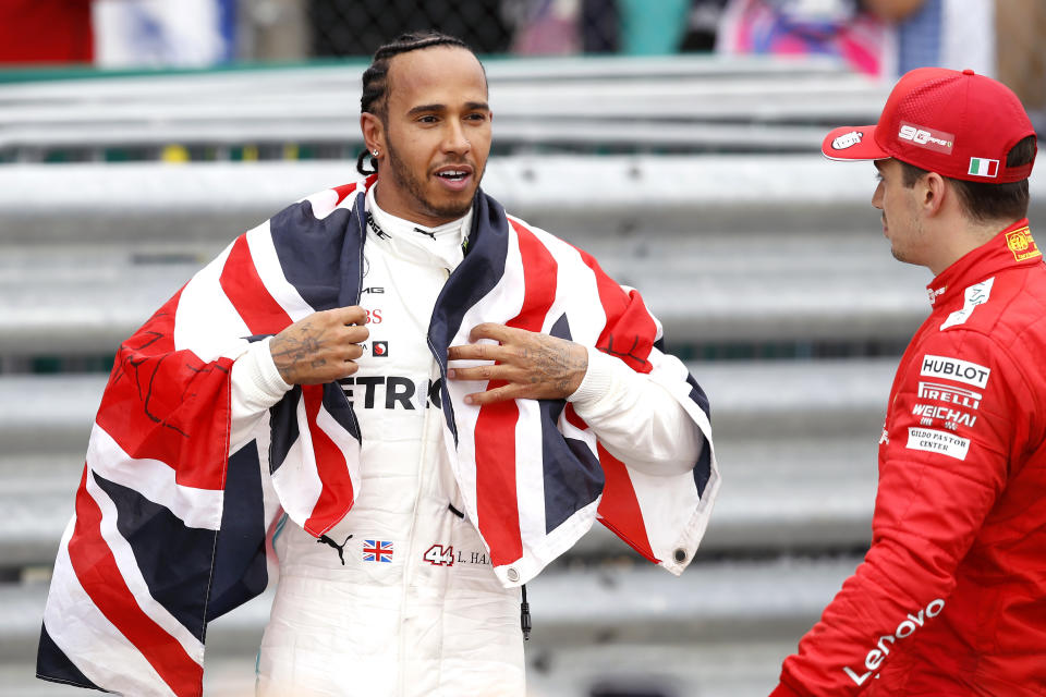 Mercedes driver Lewis Hamilton (left) celebrates winning the British Grand with Prix during the British Grand Prix at Silverstone, Towcester. (Photo by Martin Rickett/PA Images via Getty Images)