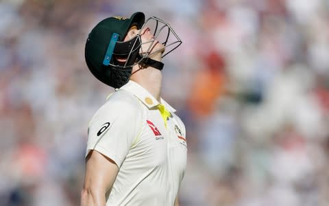 Australia's Steve Smith leaves the pitch after he is caught by England's Ben Stokes off the bowlng of England's Stuart Broad - Credit: Kirsty Wigglesworth/AP