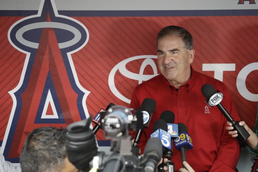 Tim Mead, the Los Angeles Angels' vice president of communications, talks to reporters during a news conference.