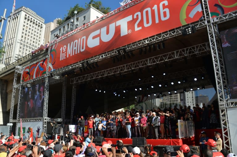 Brazilian President Dilma Rousseff (C) delivers a speech during a demonstration to mark International Workers' Day, in Sao Paulo, Brazil, on May 1, 2016