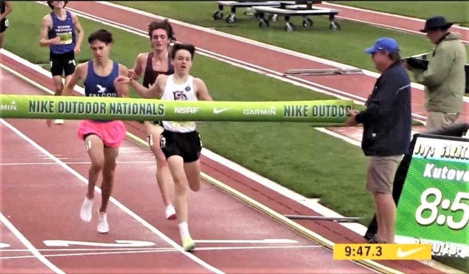 Fordham Pre's Myles Hogan of Hastings wins this traffic-jam footrace to the finish in capturing the Nike Nationals boys 2-mile championship title June 18, 2022 at Hayward Field in Eugene, Oregon.