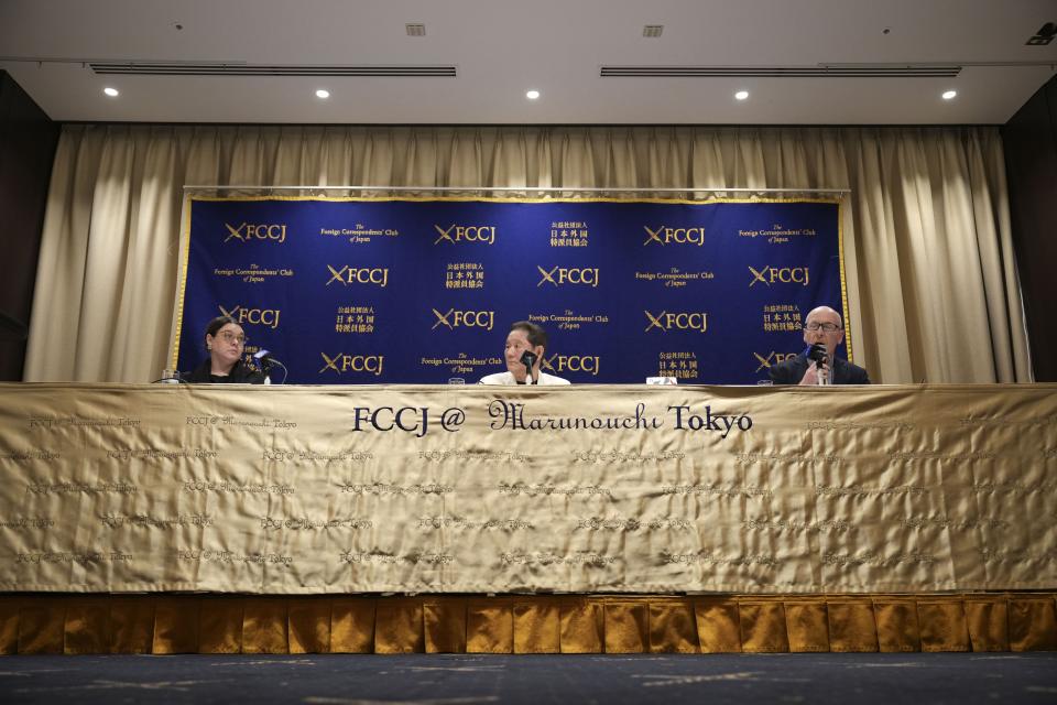 Takeshi Kitano, center, attends a press conference at the Foreign Correspondents' Club of Japan Wednesday, Nov. 15, 2023, in Tokyo. (AP Photo/Eugene Hoshiko)