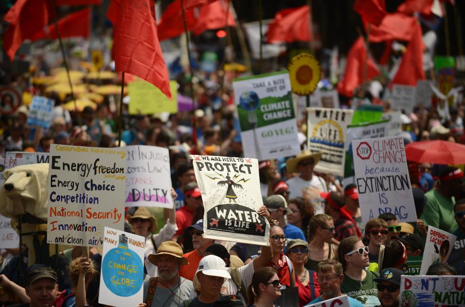 People march from the U.S. Capitol to the White House for the People's Climate Movement to protest President Donald Trump's environmental policies April 29, 2017 in Washington, DC. Demonstrators across the country are gathering to demand  a clean energy economy.
