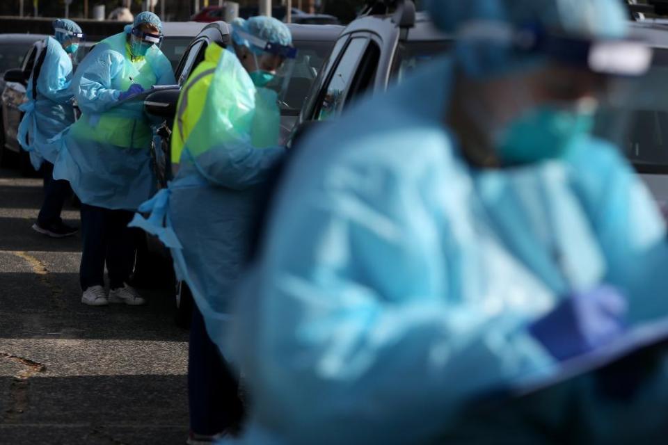 Large crowds queue in their vehicles at a Bondi Beach Covid-19 drive-through testing clinic on 22 July 2020 as health authorities work to contain several cluster outbreaks linked to virus strains in Victoria.