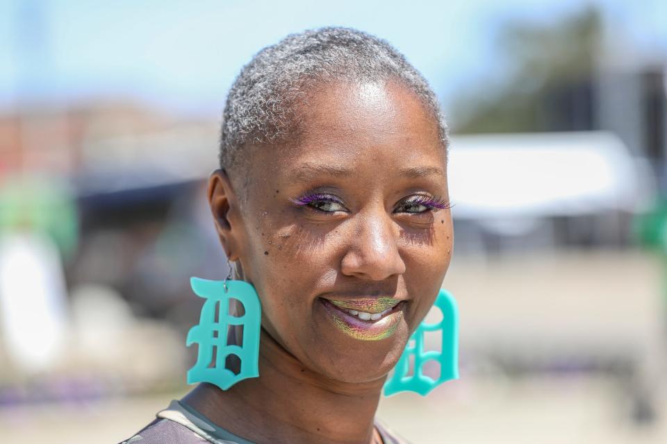 Dani Dennis, 54, of Detroit poses for a portrait at the Juneteenth Fest at the Eastern Market in Detroit on Sunday, June 19, 2022. 