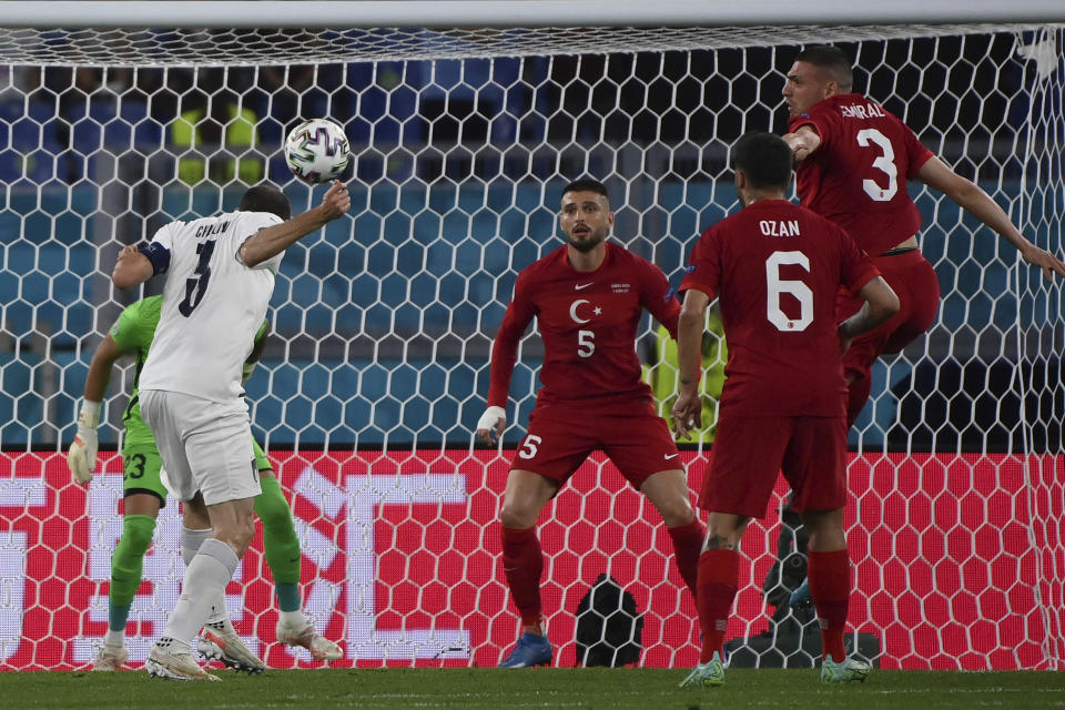 Italy's Giorgio Chiellini heads the ball during the Euro 2020, soccer championship group A match between Italy and Turkey, at the Rome Olympic stadium, Friday, June 11, 2021. (Alfredo Falcone/LaPresse via AP)