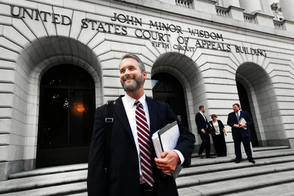 Texas Solicitor General Kyle Hawkins leaves the Fifth Circuit Court of Appeal in New Orleans on Wednesday, Oct. 3, 2018.