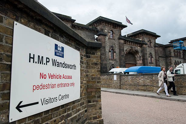 Two women walk out of the entrance to Wandsworth Prison (Getty Images)