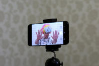 In this July 18, 2019, photo, a smartphone screen shows North Korean refugee Jang Myung-jin as he films himself in a demonstration of his YouTube broadcast during an interview at his house in Seoul, South Korea. The 32-year-old Jang is among a handful of young North Korean refugees in South Korea who have launched YouTube channels that offer a rare glimpse into the everyday lives of people in North Korea, one of the world’s most secretive and repressive countries. (AP Photo/Ahn Young-joon)