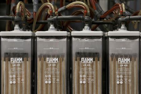 FIAMM batteries are seen as they are charged in this photo illustration taken at the battery maker's factory in Avezzano, near L'Aquila, November 28, 2014. REUTERS/Alessandro Bianchi