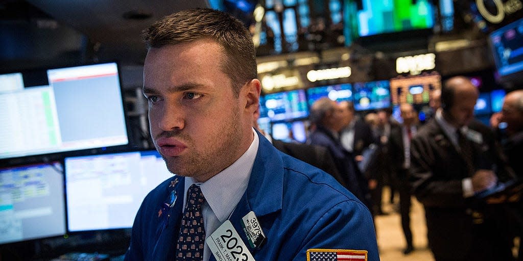 A trader works on the floor of the New York Stock Exchange