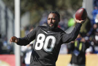 AFC wide receiver Jarvis Landry of the Cleveland Browns tosses the ball back after making a reception during a practice for the NFL Pro Bowl football game Wednesday, Jan. 22, 2020, in Kissimmee, Fla. (AP Photo/John Raoux)