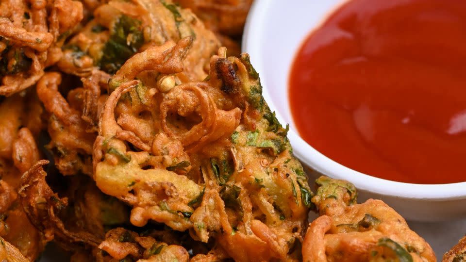 Pakoras are best eaten while still hot. - Nabeel Ahmed/iStockphoto/Getty Images