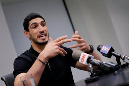 FILE PHOTO - Turkish NBA player Enes Kanter speaks about the revocation of his Turkish passport and return to the United States at National Basketball Players Association headquarters in New York, U.S. on May 22, 2017. REUTERS/Lucas Jackson/File Photo