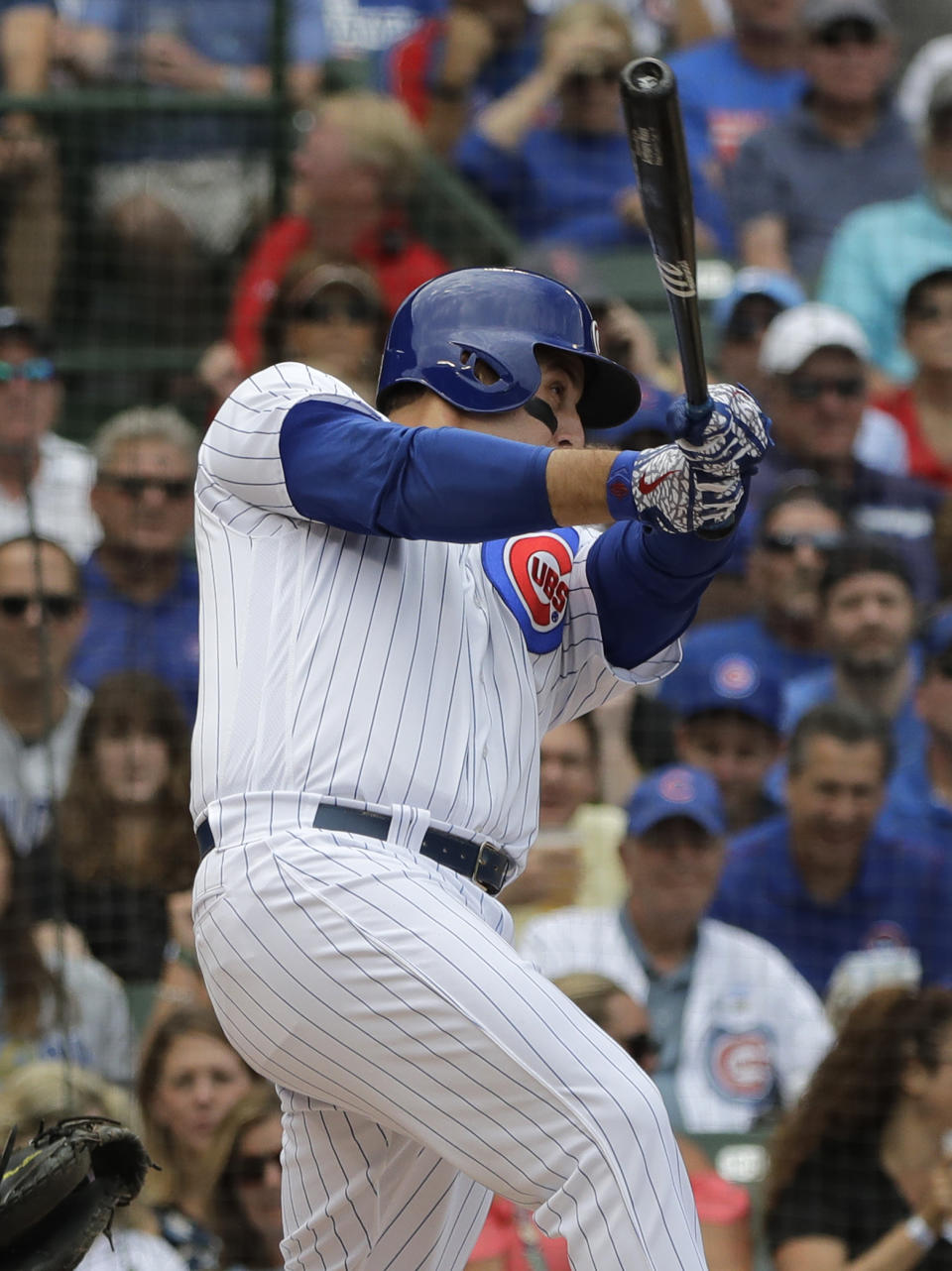 Chicago Cubs' Anthony Rizzo hits a two-run home run against the Milwaukee Brewers during the first inning of a baseball game Wednesday, Aug. 15, 2018, in Chicago. (AP Photo/Nam Y. Huh)