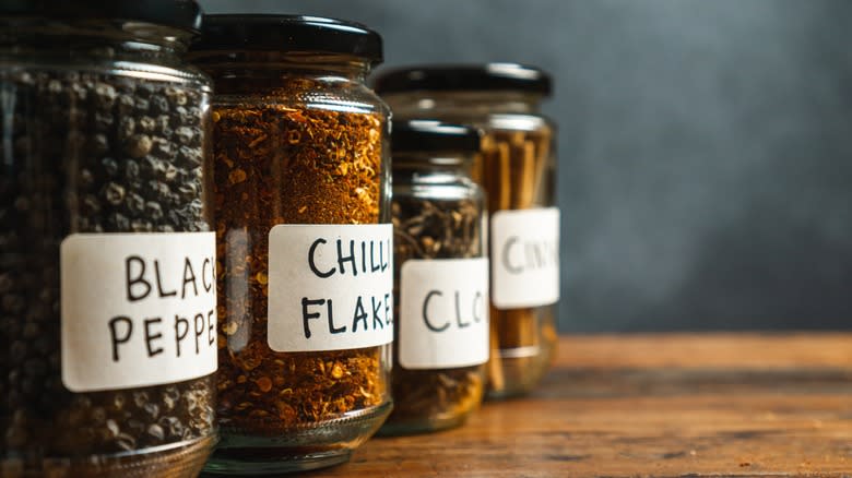 Various spices in hand-labeled jars