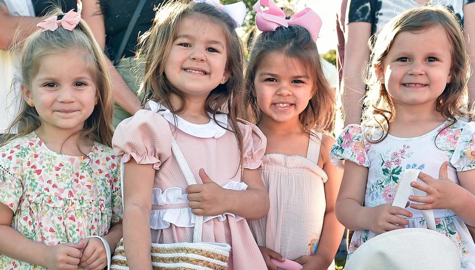 Waiting for the egg drop, (left to right) Reyna Blas, 3, Vallen Glauser, 4, Alessi Kompo, 3, Lennon Walen, 3, all of Sarasota.