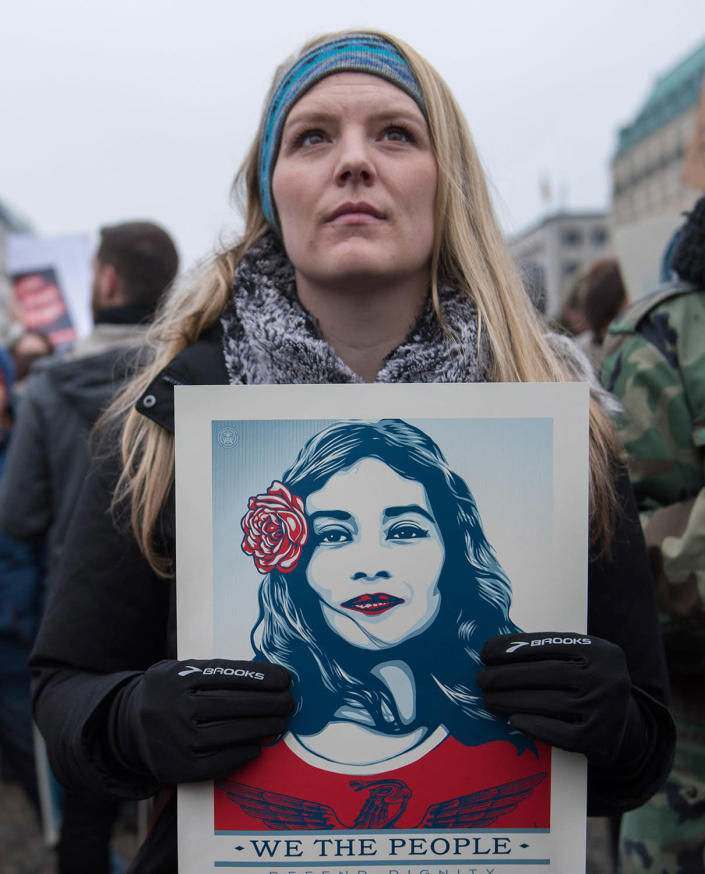 <p>Women and men attend a protest for women’s rights and freedom in solidarity with the Women’s March on Washington in front of Brandenburger Tor on January 21, 2017 in Berlin, Germany. (Photo by Steffi Loos/Getty Images) </p>