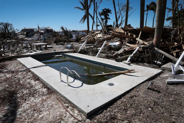 A swimming pool lays amongst the wreckage left in the wake of Hurricane Ian is shown on the island of Matlacha on Sept. 30. (Photo: Win McNamee via Getty Images)