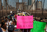 <p>Demonstrators march on Brooklyn Bridge during “Keep Families Together” march to protest Trump administration’s immigration policy in New York, June 30, 2018. (Photo: Shannon Stapleton/Reuters) </p>