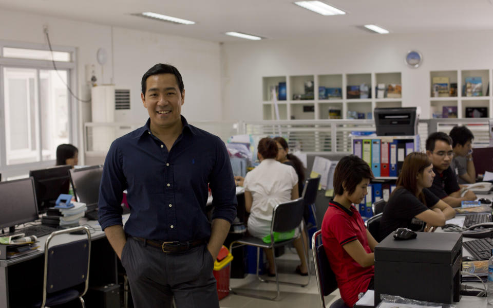 In this April 12, 2014 photo, Nay Aung, founder of Oway company poses in his office, Yangon, Myanmar. Nay Aung, a 34-year-old Stanford graduate and former business operations and strategy manager at Google Inc., is among a vanguard of overseas-trained professionals who have returned to Myanmar to find both opportunities and challenges. (AP Photo/Gemunu Amarasinghe)
