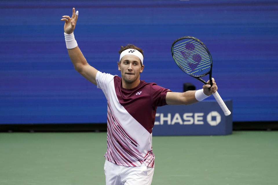 Casper Ruud, of Norway, celebrates winning the first set against Karen Khachanov, of Russia, during the semifinals of the U.S. Open tennis championships, Friday, Sept. 9, 2022, in New York. (AP Photo/Mary Altaffer)