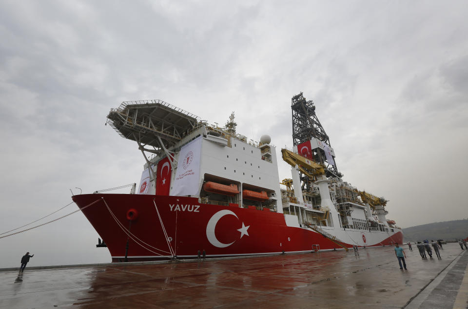 A view of the drilling ship 'Yavuz' scheduled to be dispatched to the Mediterranean, at the port of Dilovasi, outside Istanbul, Thursday, June 20, 2019. Turkish officials say the drillship Yavuz will be dispatched to an area off Cyprus to drill for gas. Another drillship, the Fatih, is now drilling off Cyprus' west coast at a distance of approximately 40 miles in waters where the east Mediterranean island nation has exclusive economic rights. The Cyprus government says Turkey's actions contravene international law and violate Cypriot sovereign rights. (AP Photo/Lefteris Pitarakis)