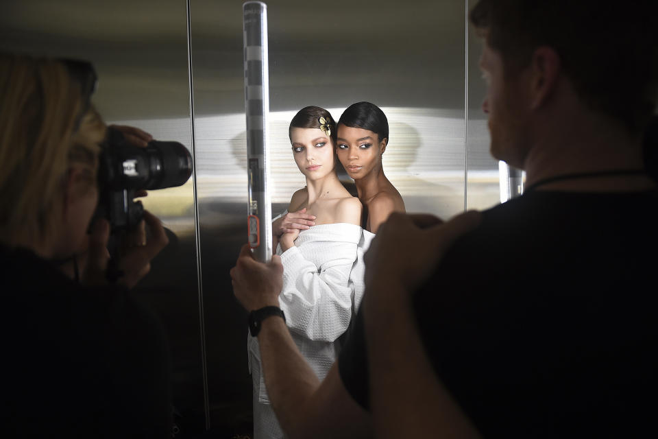 Models prepare backstage at the Tom Ford show at Milk Studios during NYFW Fall/Winter 2020 on Friday, Feb. 7, 2020, in Los Angeles. (Photo by Jordan Strauss/Invision/AP)