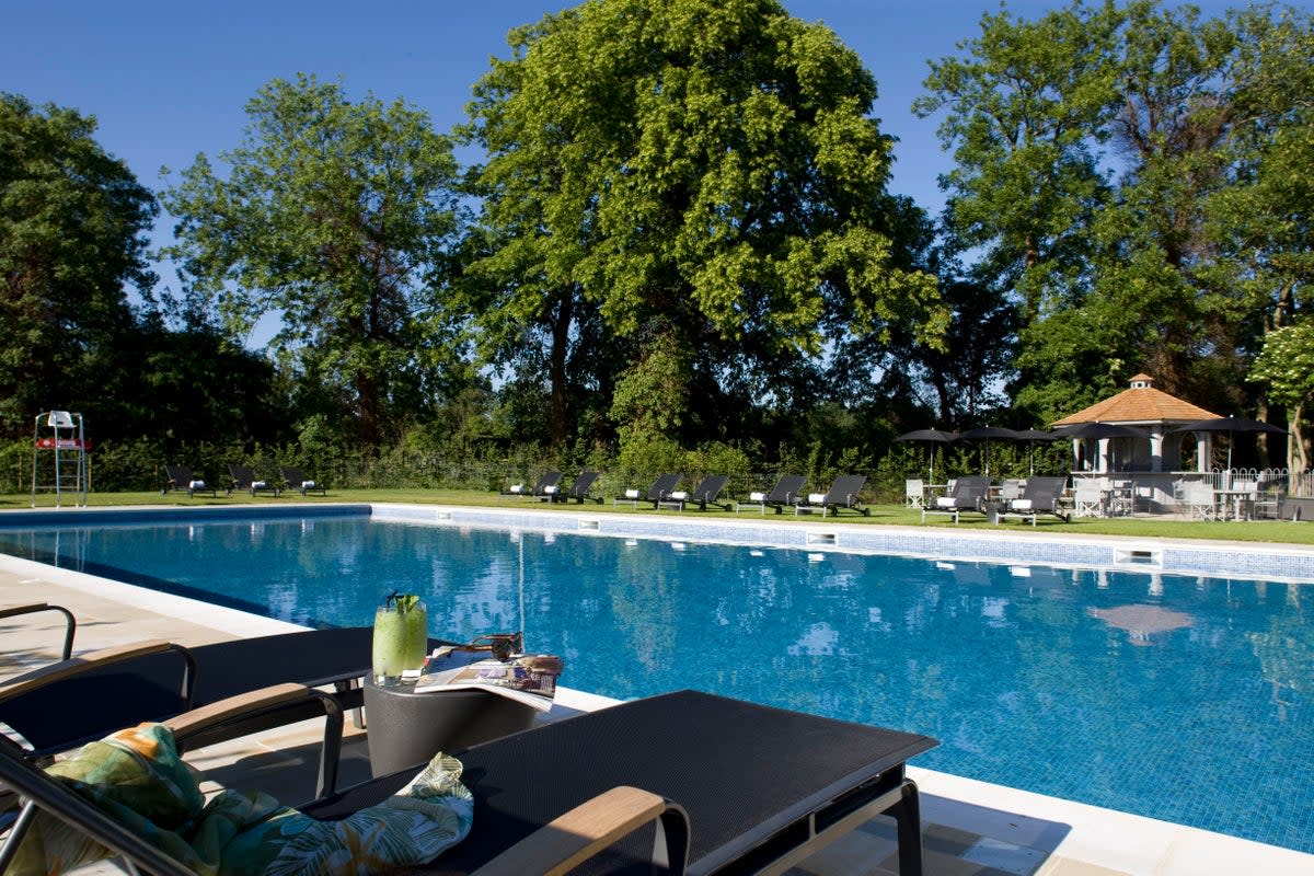 Relax by the pool (The Runnymede on Thames Hotel)