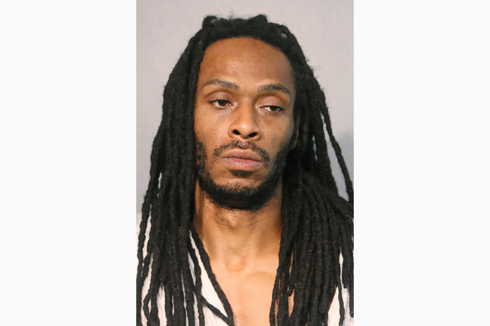 This undated photo provided by the Chicago Police Department shows Darrell Johnson. Authorities announced Tuesday, Aug. 4, 2020, that they have charged Johnson with first-degree murder in the death of 9-year-old Janari Ricks, who was fatally shot while playing in front of his Chicago home Friday, July 31. (Chicago Police Department via AP)