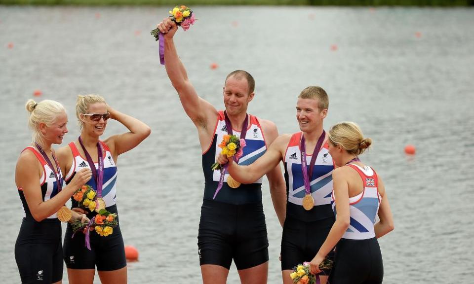 David Smith (centre) and the rest of the British mixed coxed four rowing team in 2012.