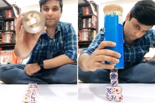 Guy performs amazing trick of dice stacking