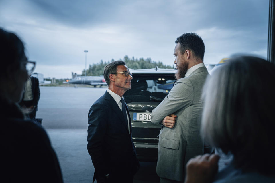 In this photo provided by the Swedish government, Johan Floderus, right, speaks with Swedish Prime Minister Ulf Kristersson at Arlanda airport in Stockholm, Sweden on Saturday, June 15, 2024, after being released from prison in Iran. (Tom Samuelsson/Swedish government/TT News Agency via AP)