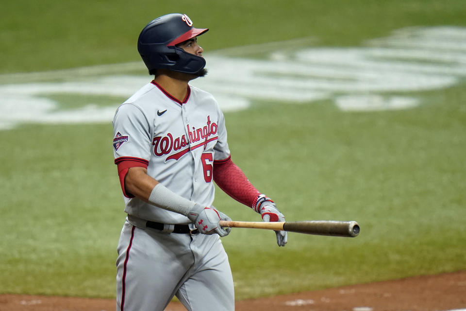 Washington Nationals' Luis Garcia (62) watches his two-run home run off Tampa Bay Rays relief pitcher Nick Anderson during the 10th inning of a baseball game Wednesday, Sept. 16, 2020, in St. Petersburg, Fla. (AP Photo/Chris O'Meara)